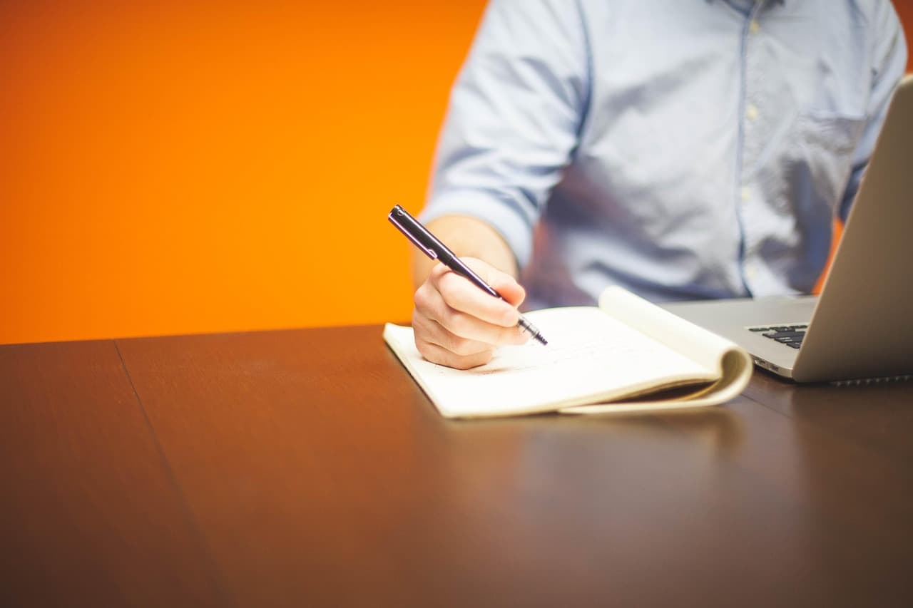 Contractor reviewing a work contract on site