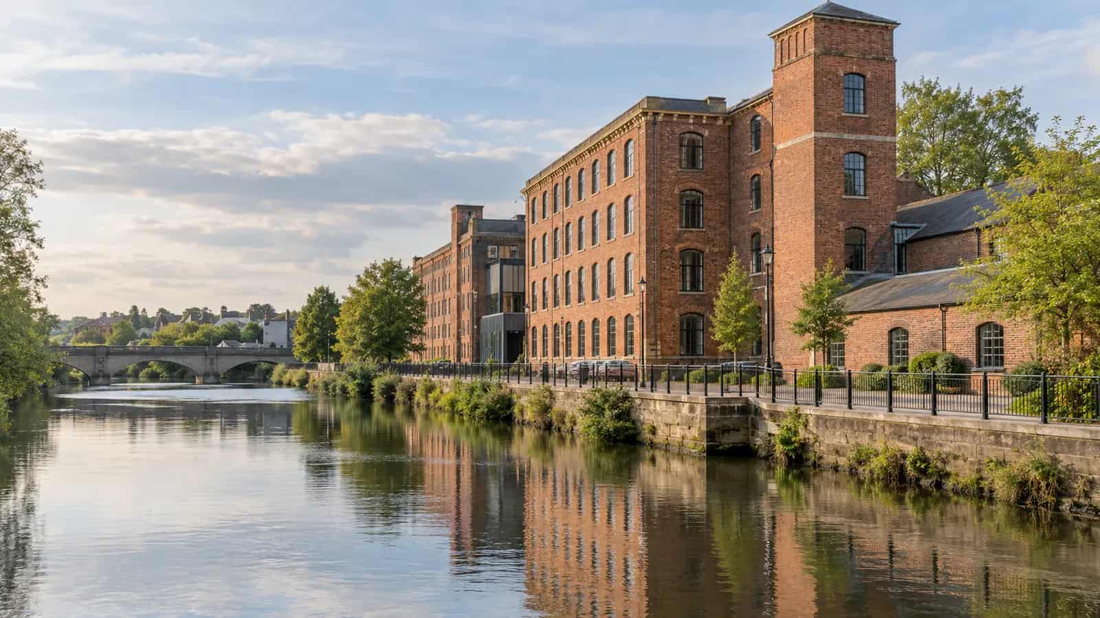 Historic riverside buildings beside the River Derwent in Derby