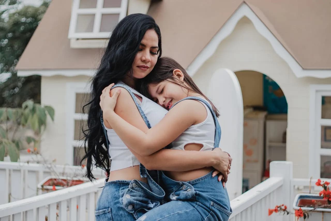 Young couple outside their first home